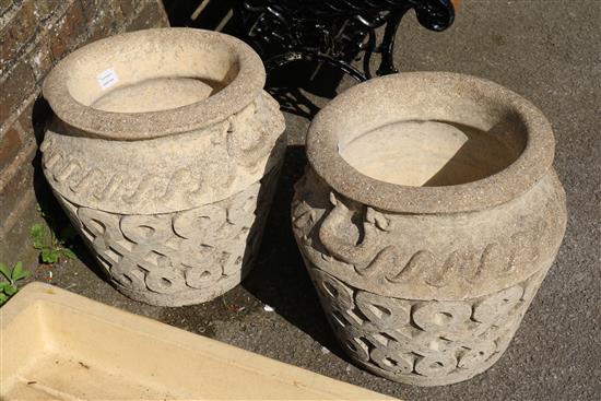 A pair of Cotswold Studios composition garden urns, 16in.